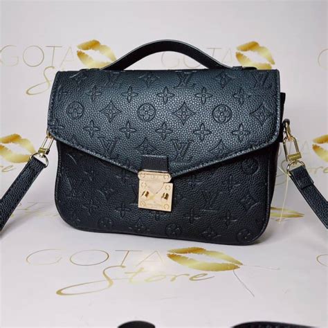 louis vuitton embossed bag.